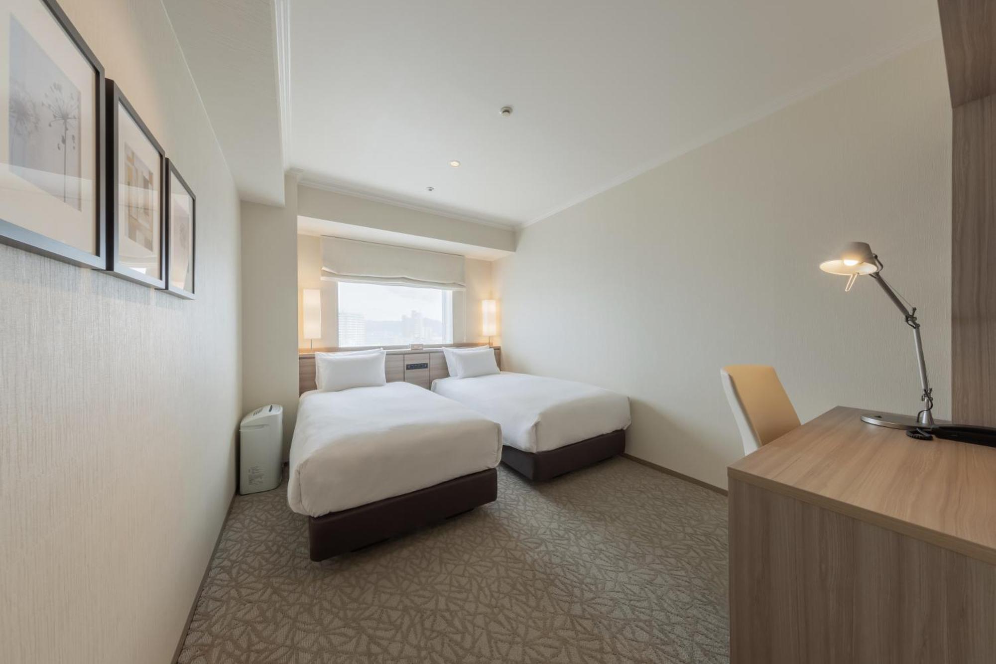 Hotel Associa Toyohashi Exteriör bild A room at the hotel