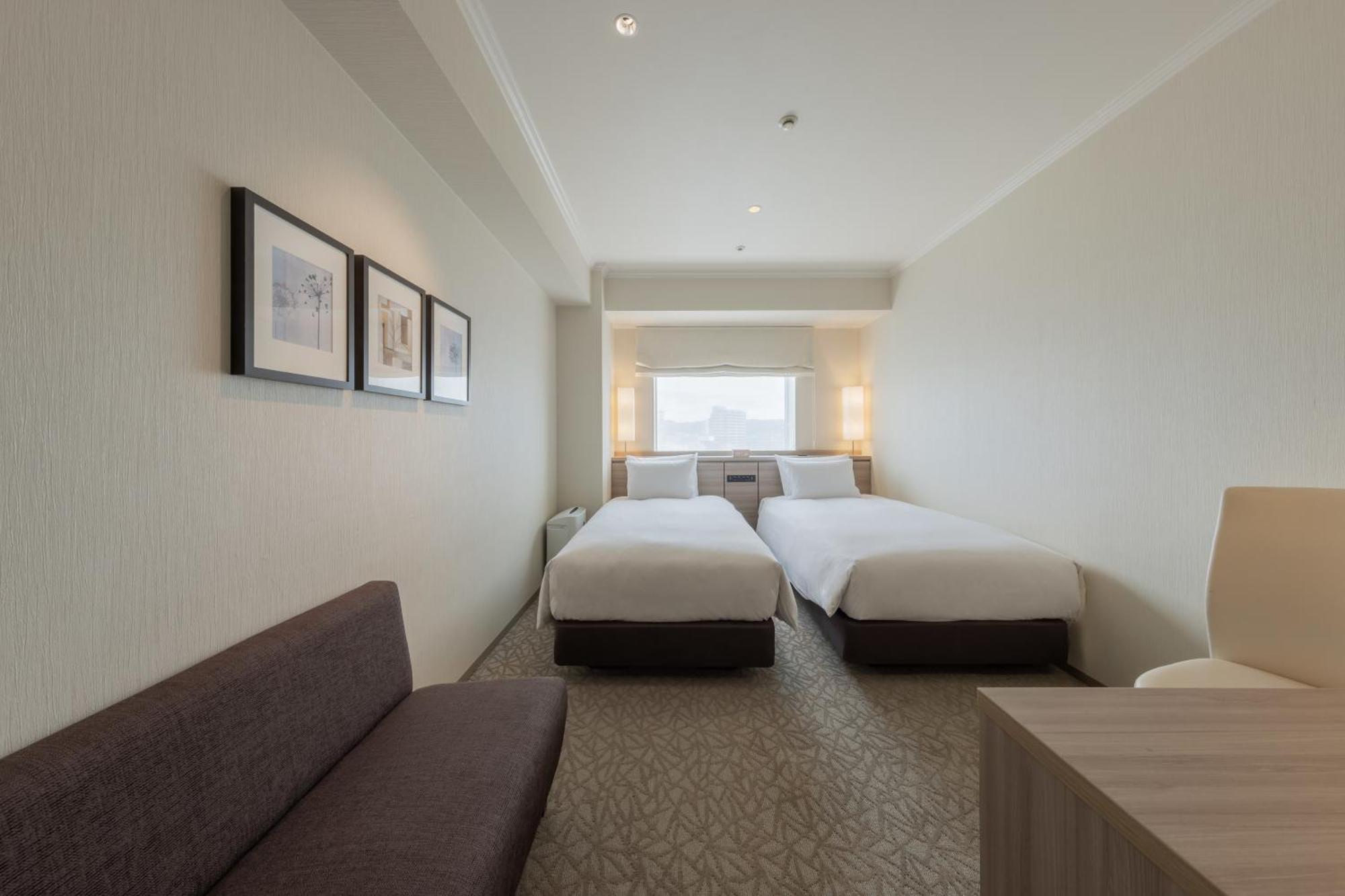 Hotel Associa Toyohashi Exteriör bild A room at the hotel
